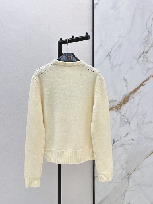 Carriage Pattern Cream Sweater