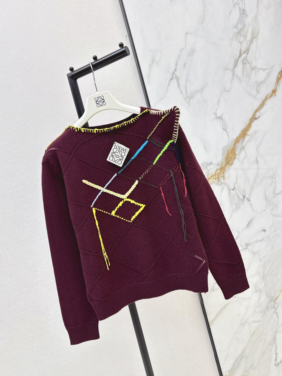Asymmetrical crew neck sweater