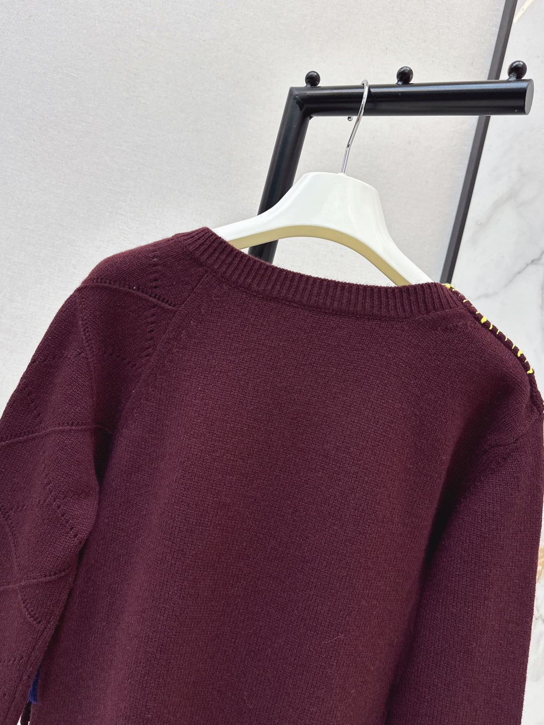 Asymmetrical crew neck sweater