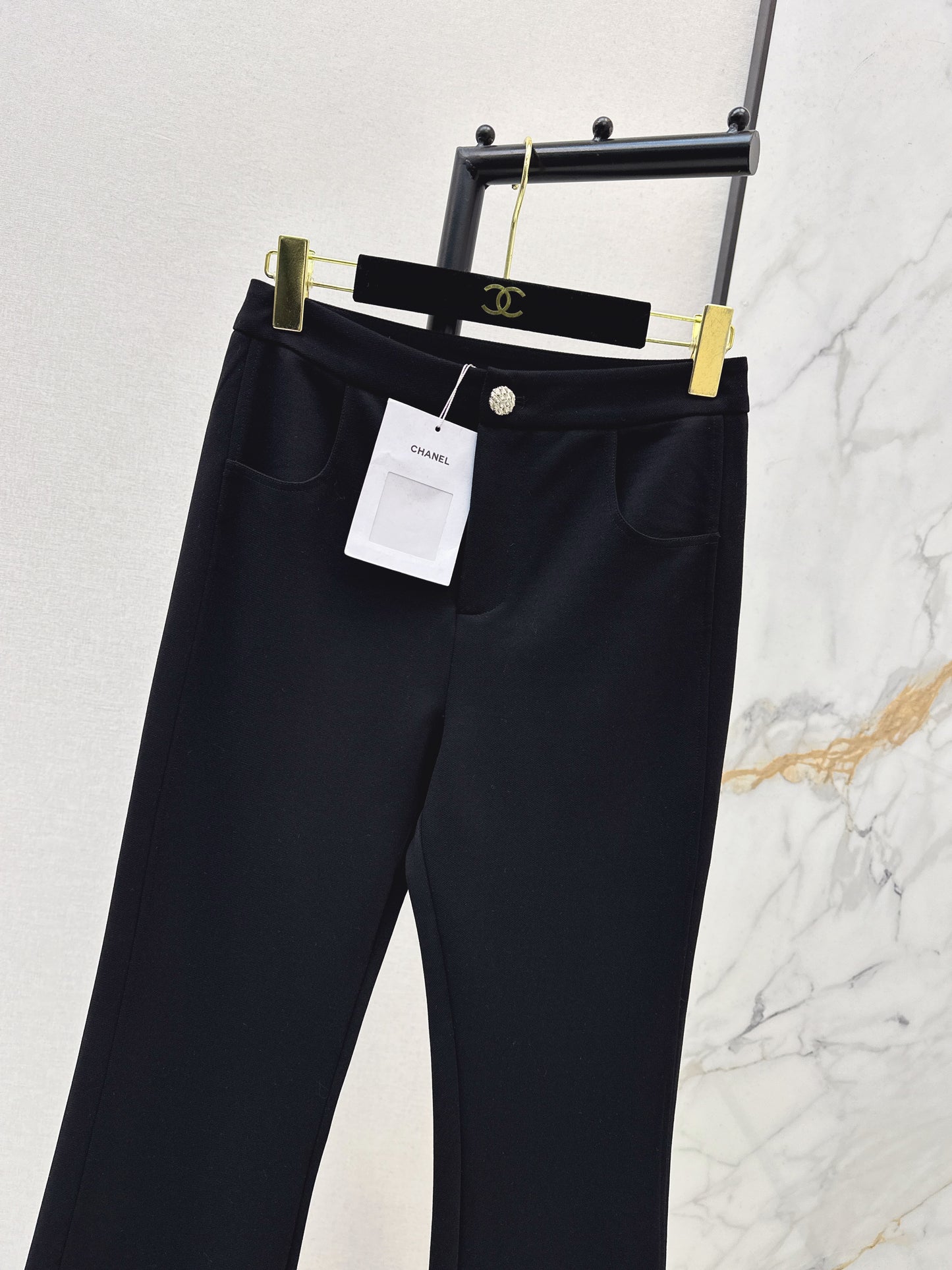 High-waisted flared trousers