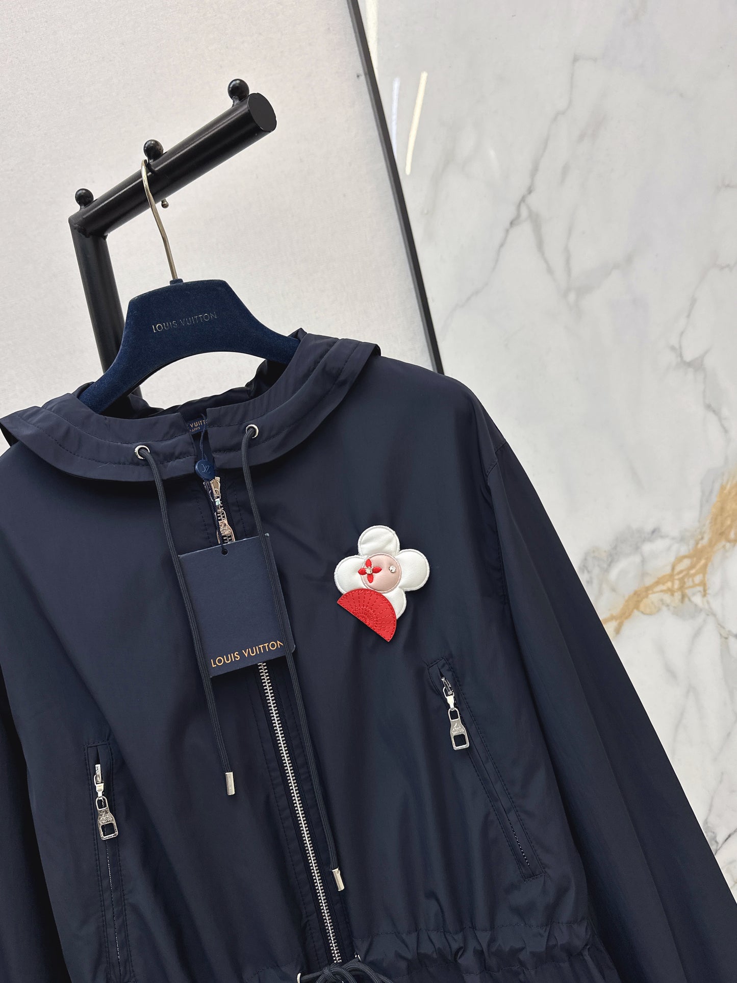 Hooded, fitted jacket