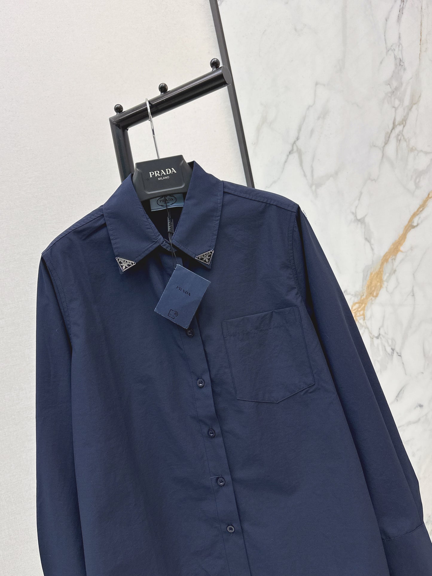 Triangle logo loose-fitting shirt