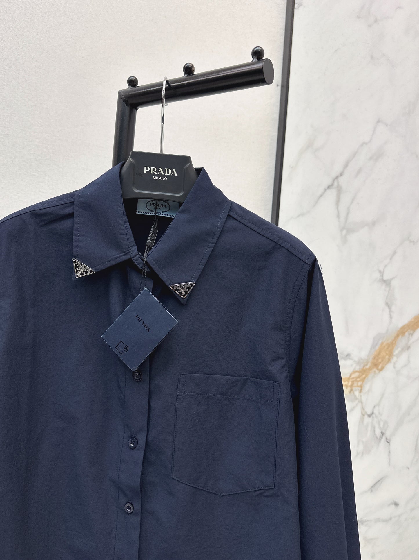 Triangle logo loose-fitting shirt