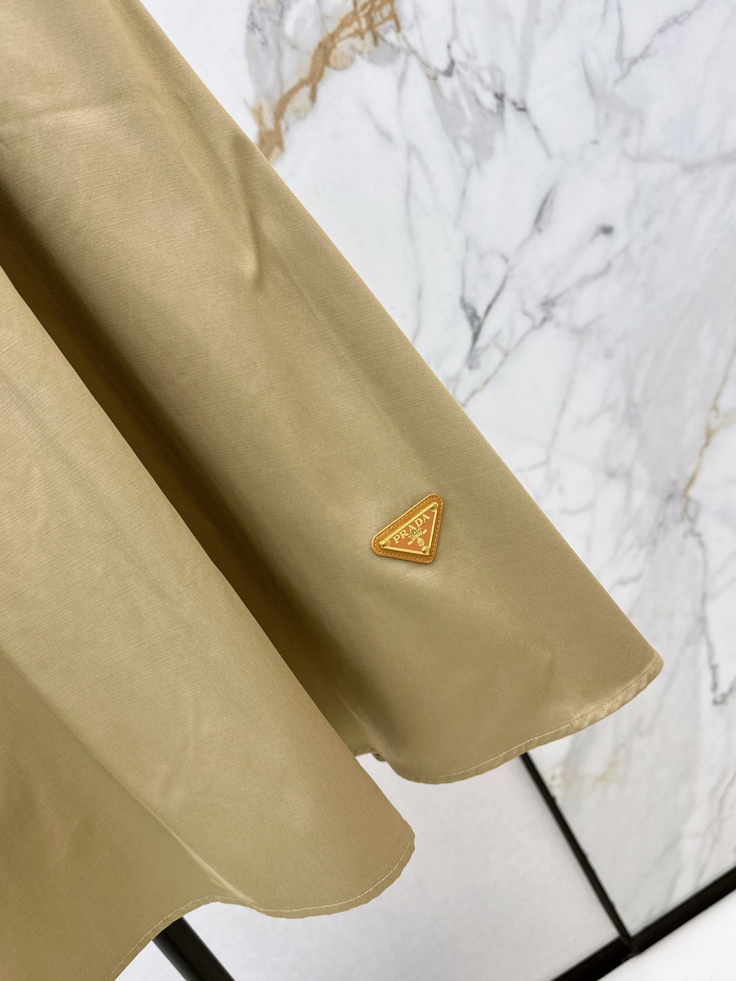 Leather-buckled A-line skirt