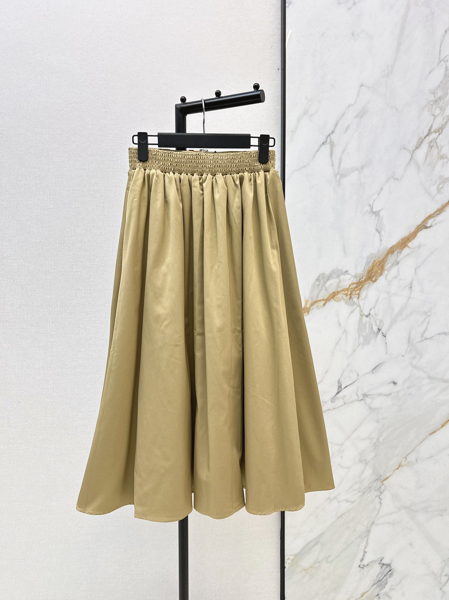 Leather-buckled A-line skirt