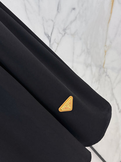 Leather-buckled A-line skirt