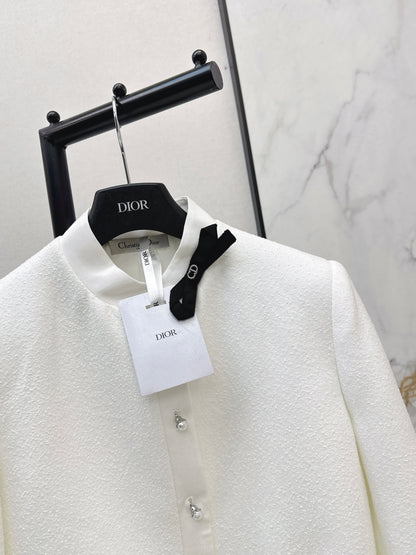 Bow-decorated coat