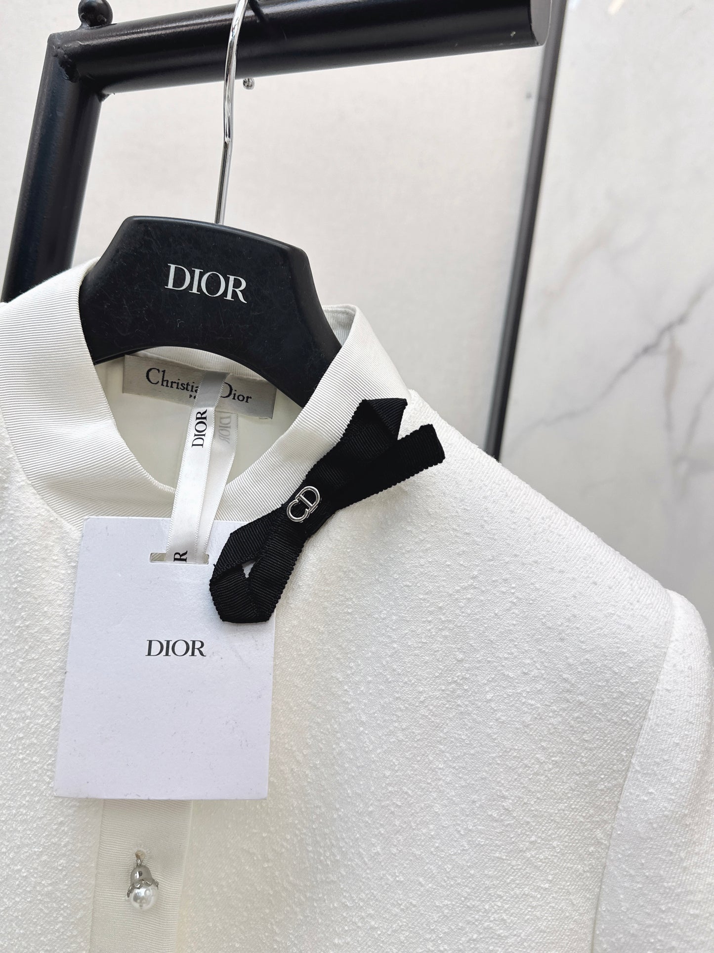 Bow-decorated coat
