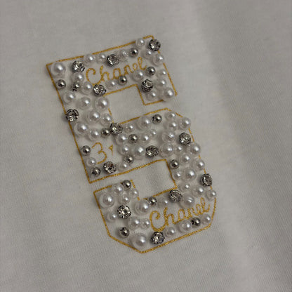 Pearl-studded T-shirt