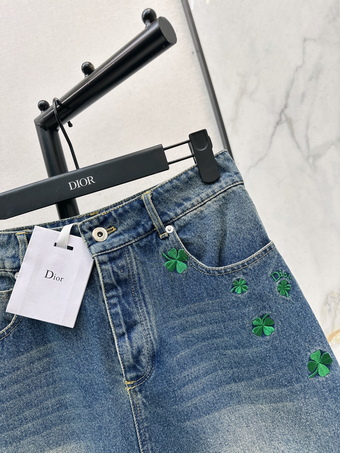 Four-leaf clover denim midi skirt