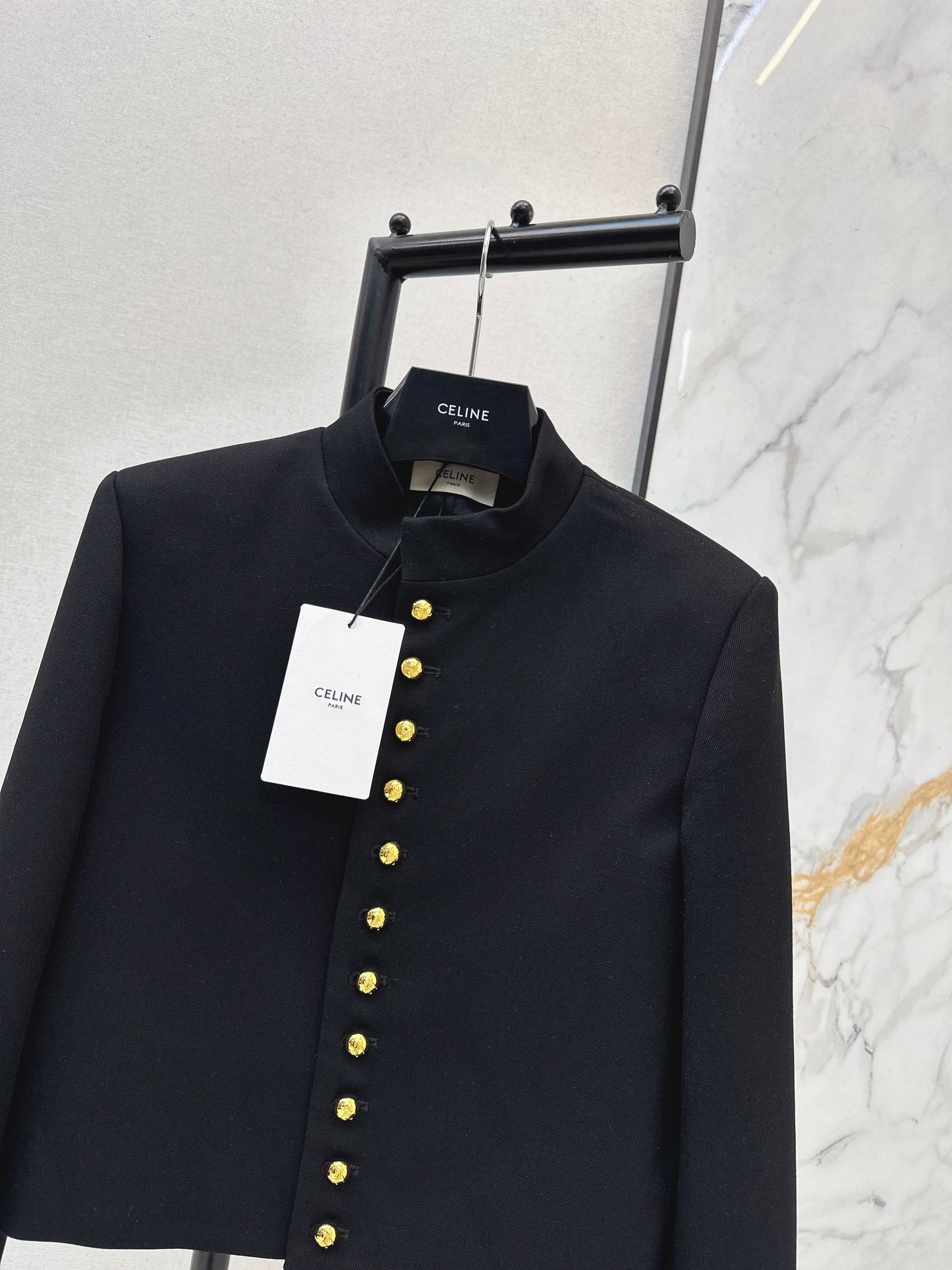 Gold-buttoned jacket