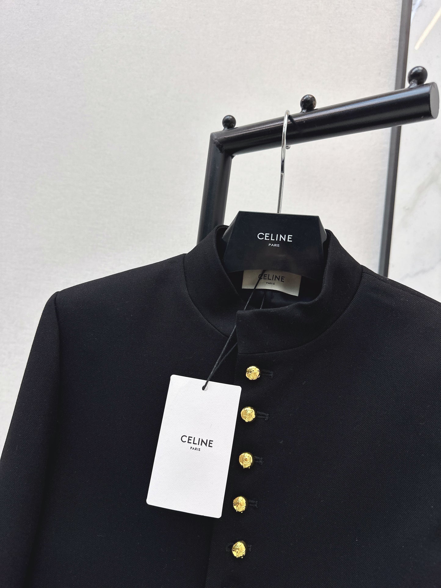 Gold-buttoned jacket