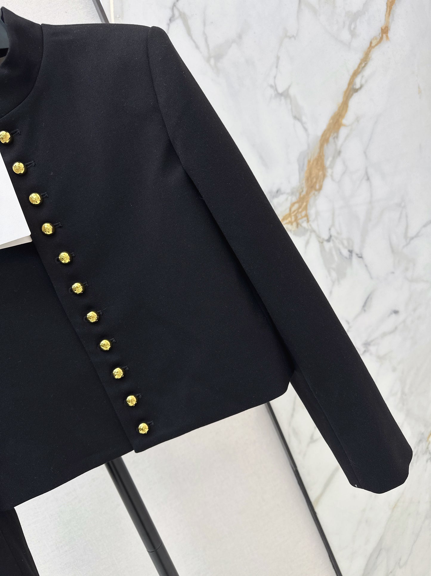 Gold-buttoned jacket