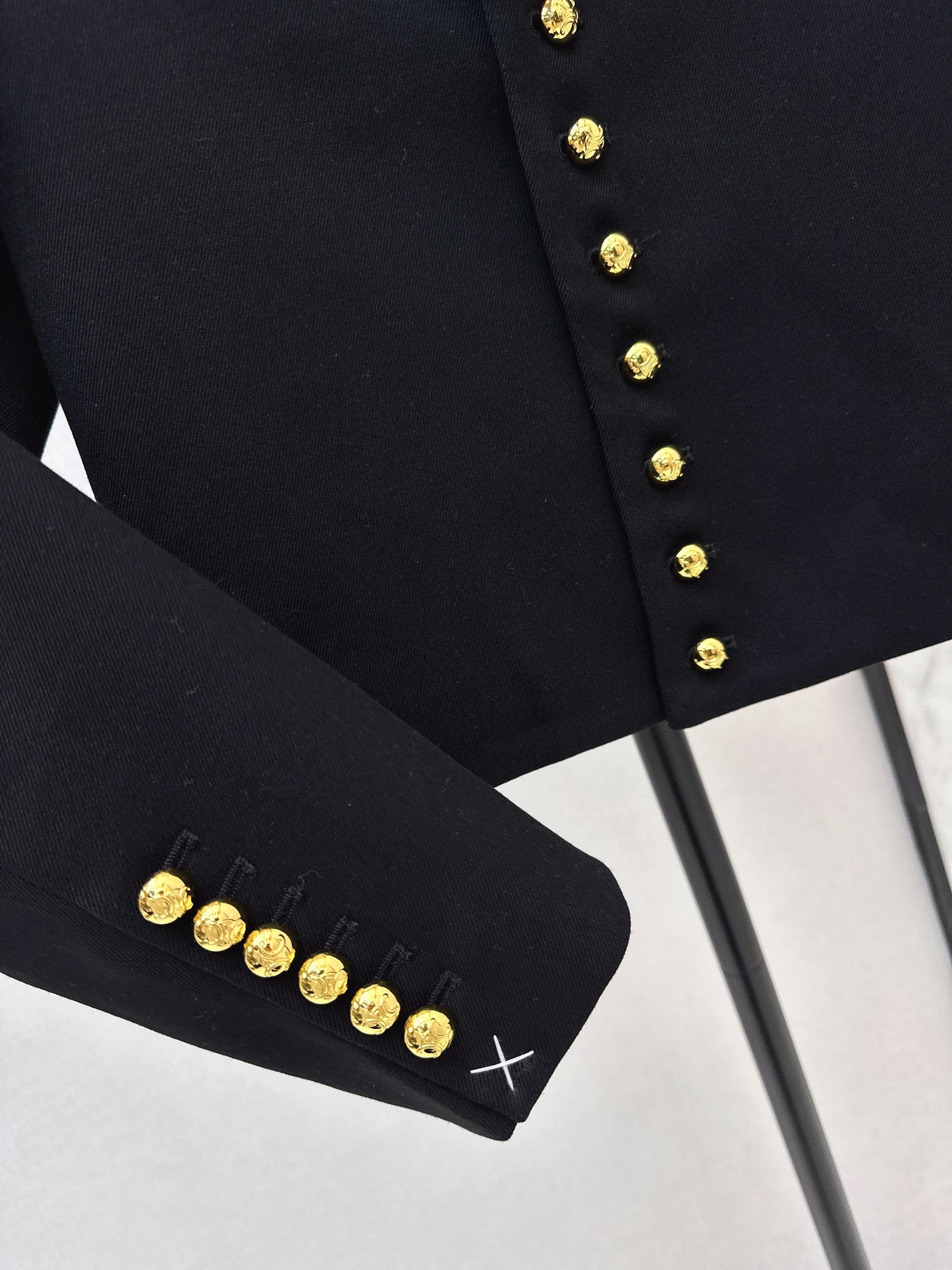 Gold-buttoned jacket