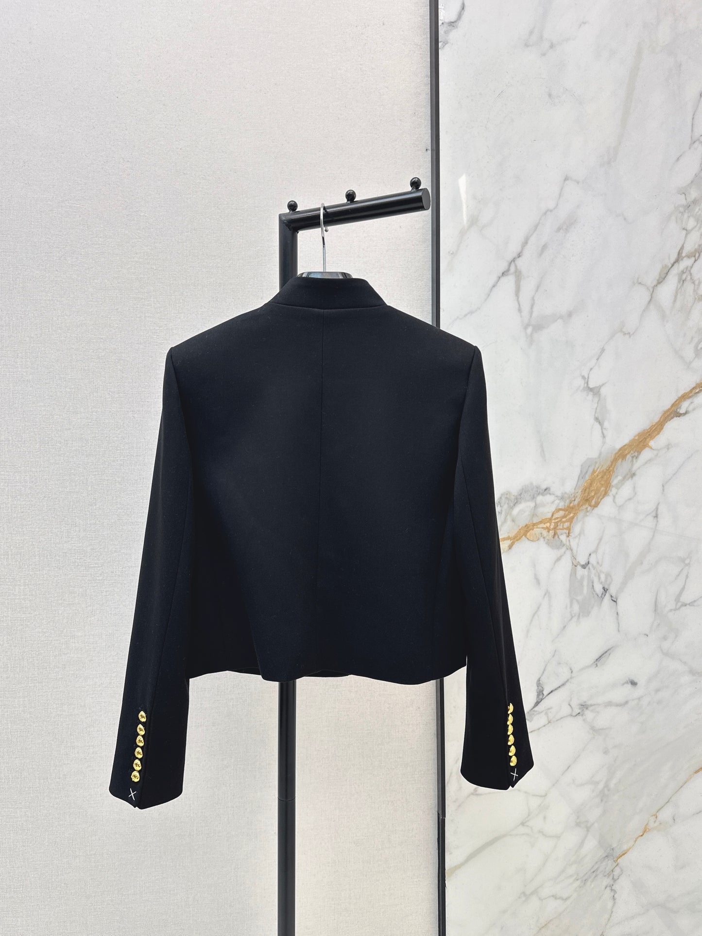 Gold-buttoned jacket