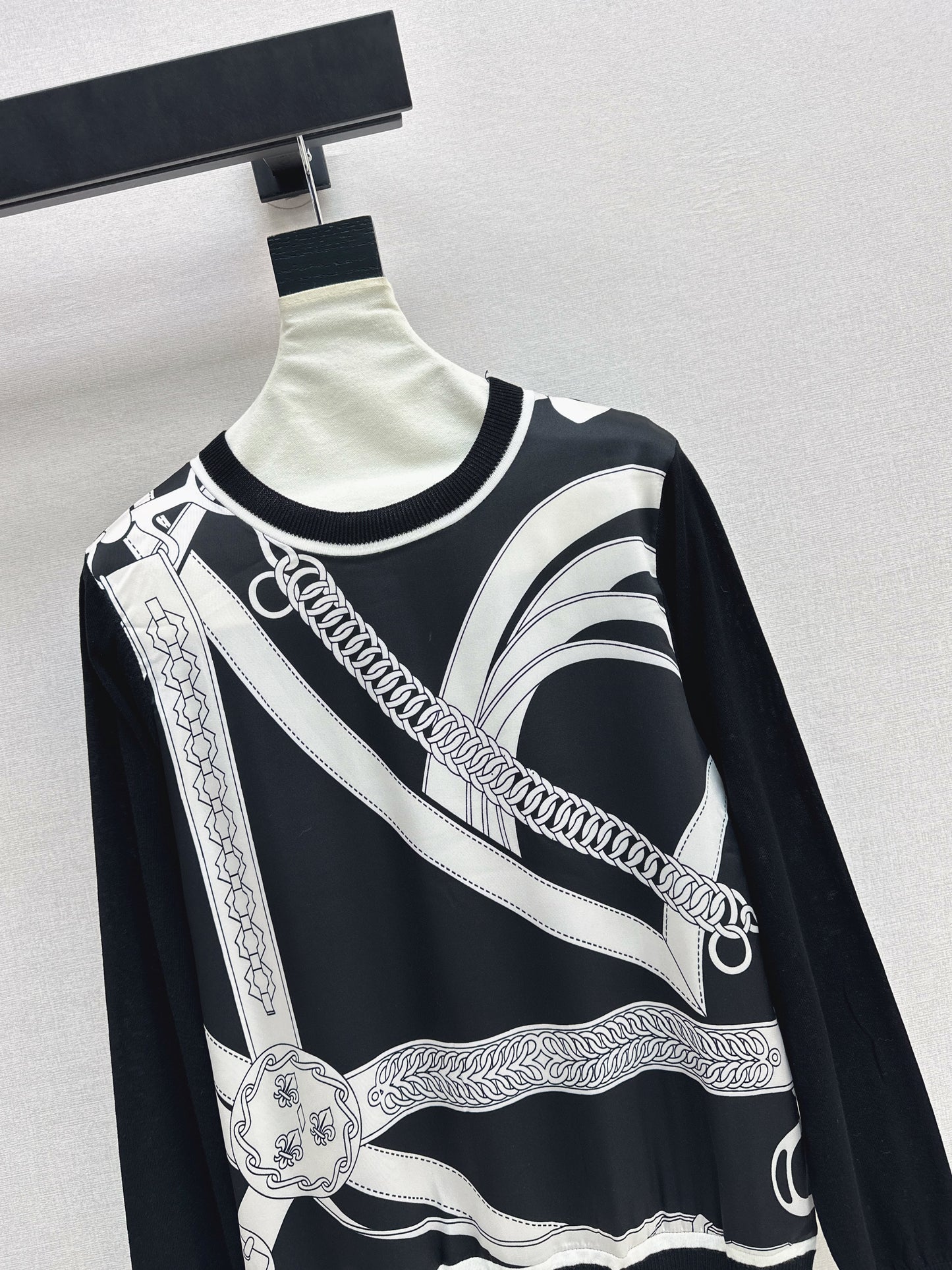 Patterned patchwork knit sweater