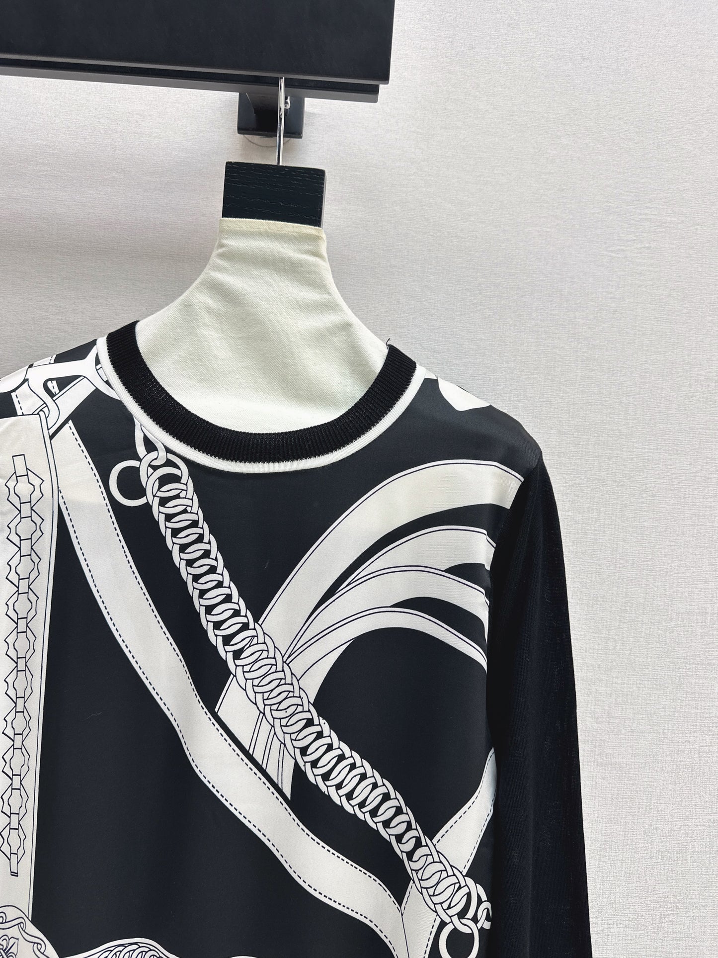 Patterned patchwork knit sweater