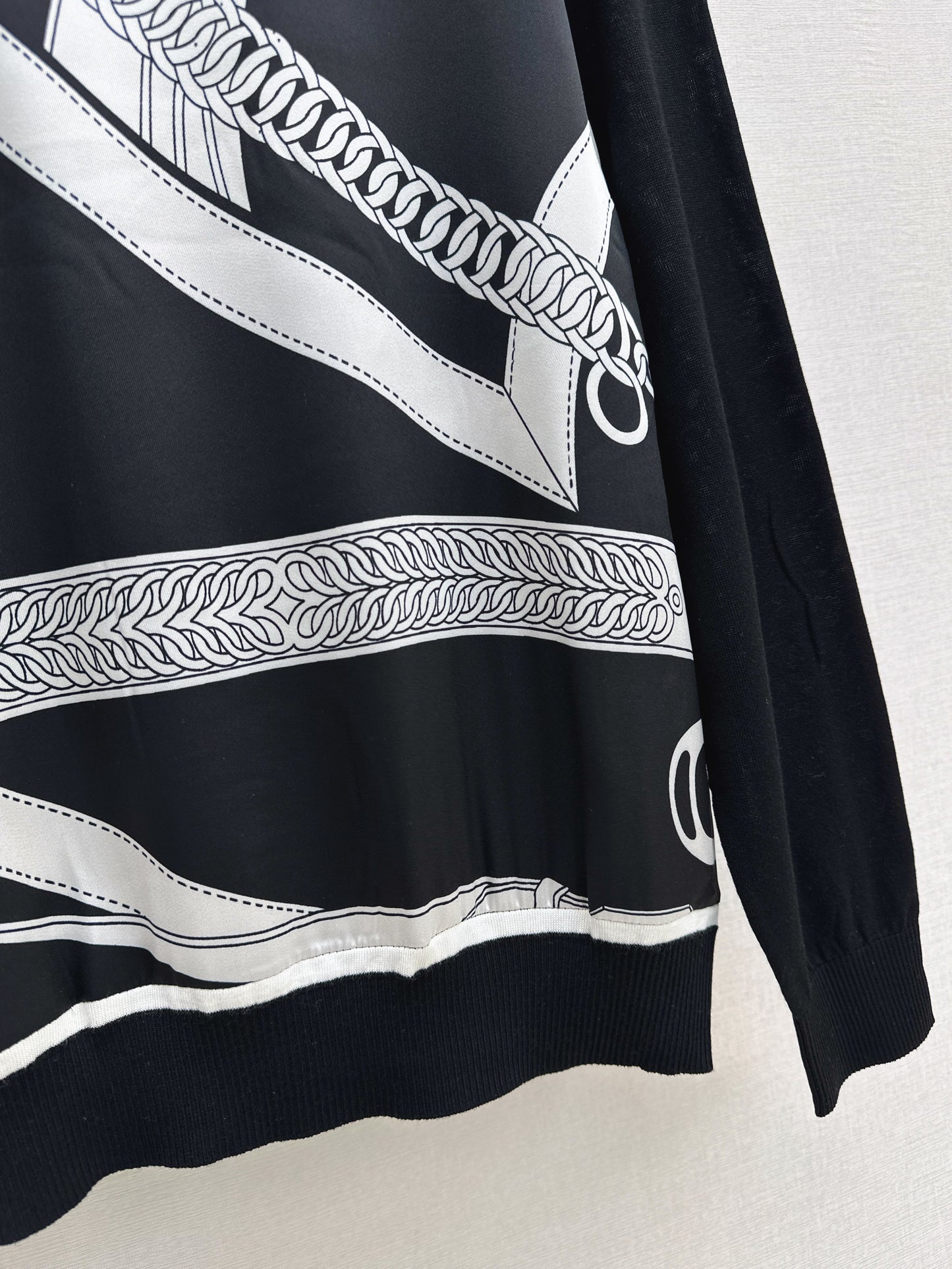 Patterned patchwork knit sweater