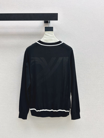 Patterned patchwork knit sweater