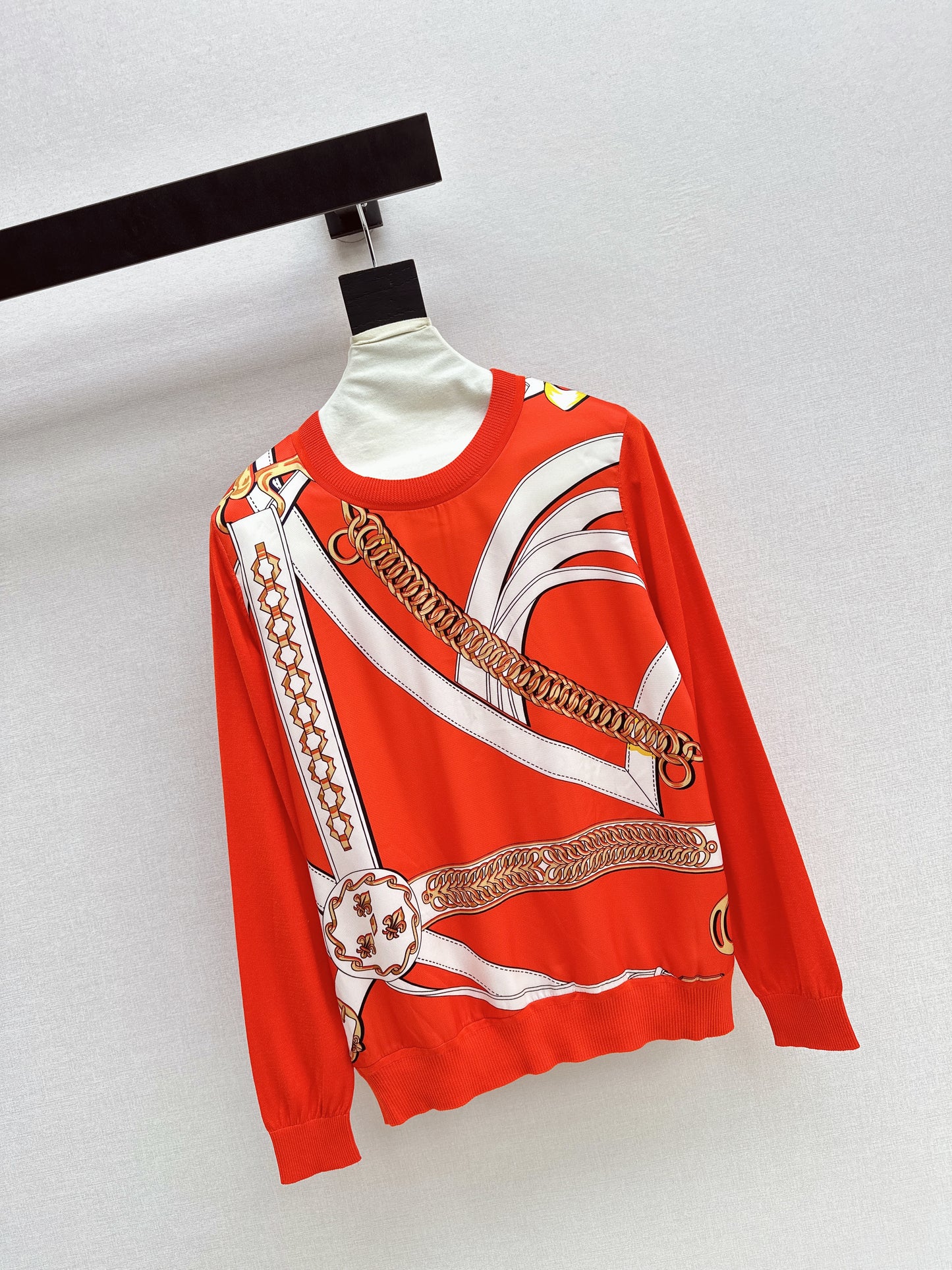 Patterned patchwork knit sweater
