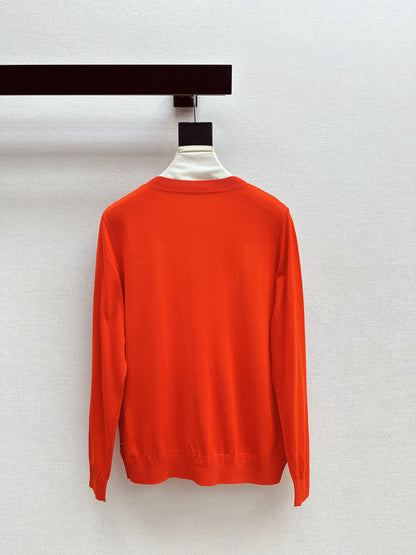 Patterned patchwork knit sweater