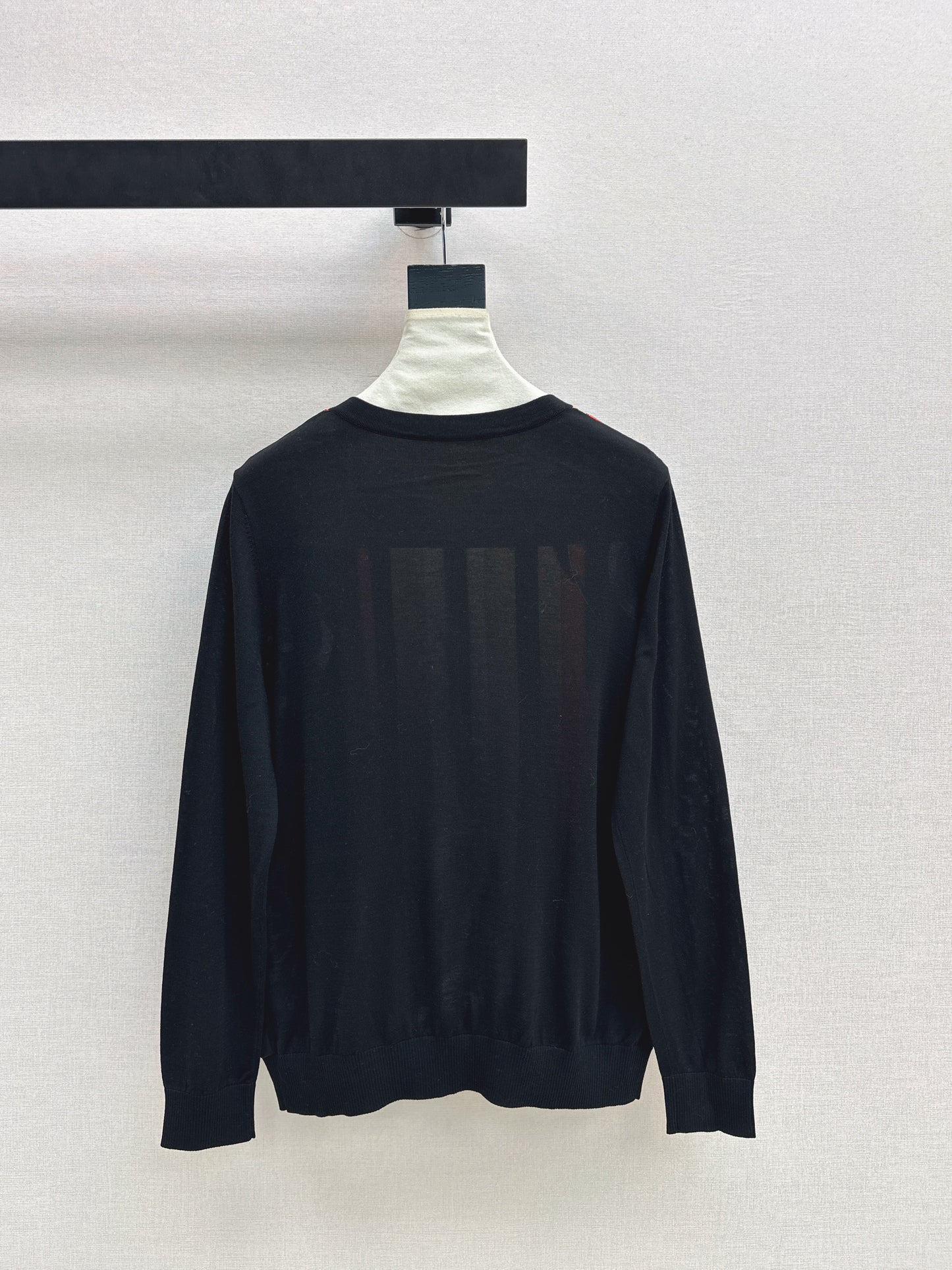 Patterned patchwork knit sweater