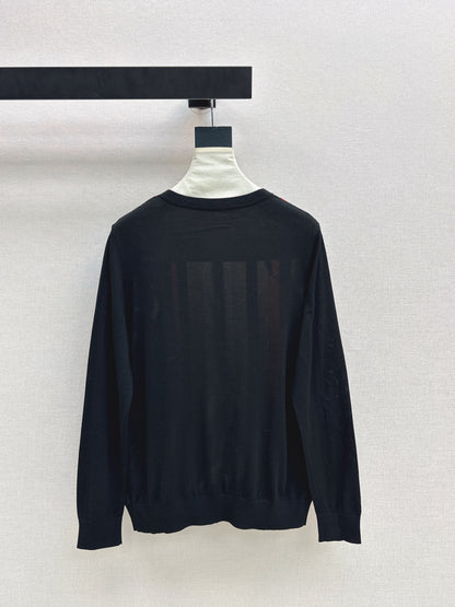 Patterned patchwork knit sweater