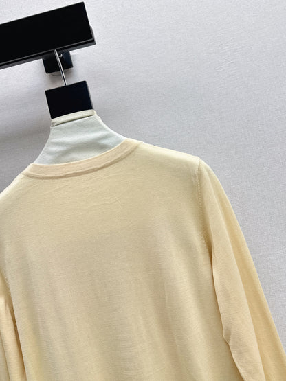 Patterned patchwork knit sweater