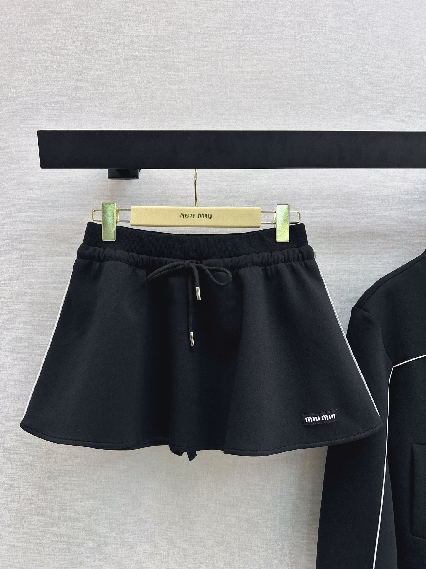 Stand-up collar jacket + midi skirt