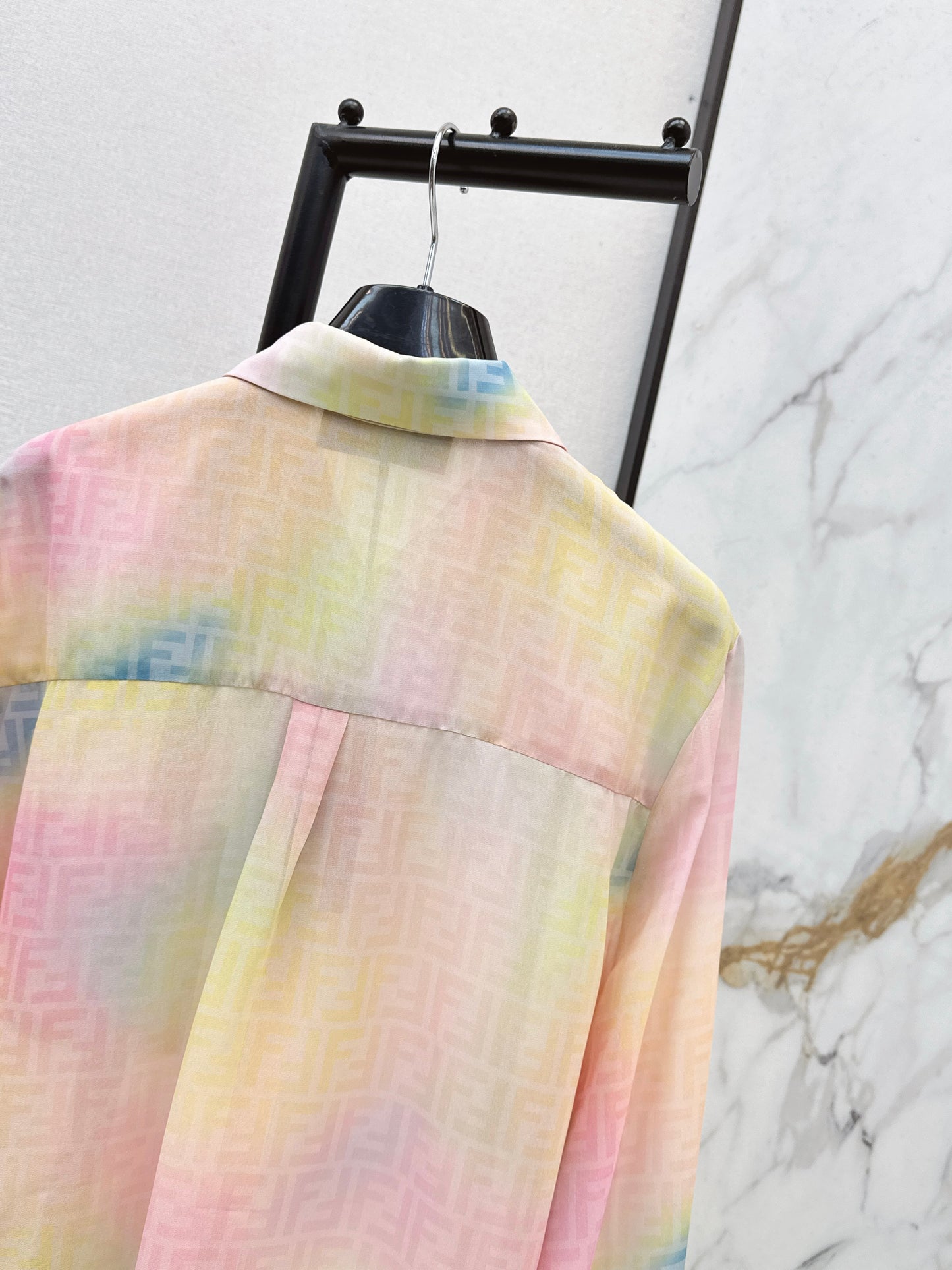 Rainbow-colored printed shirt