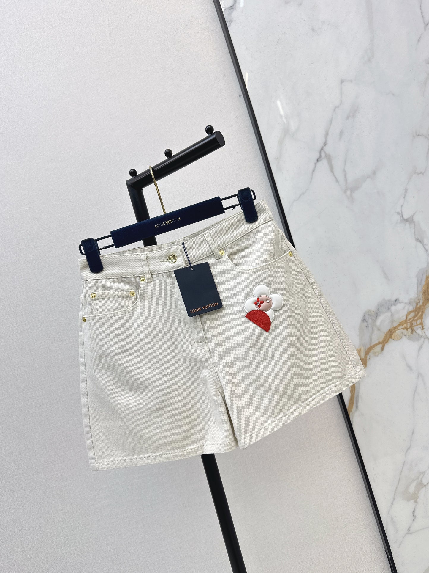 Embroidered denim shorts