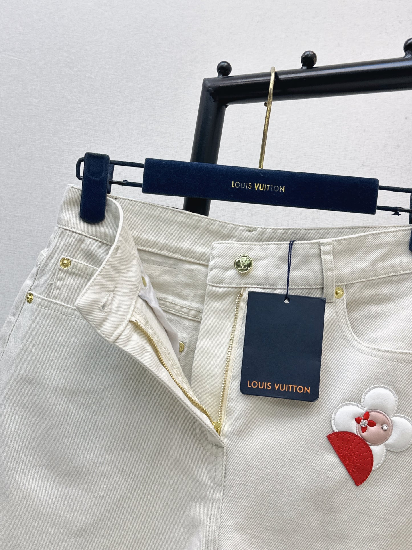Embroidered denim shorts