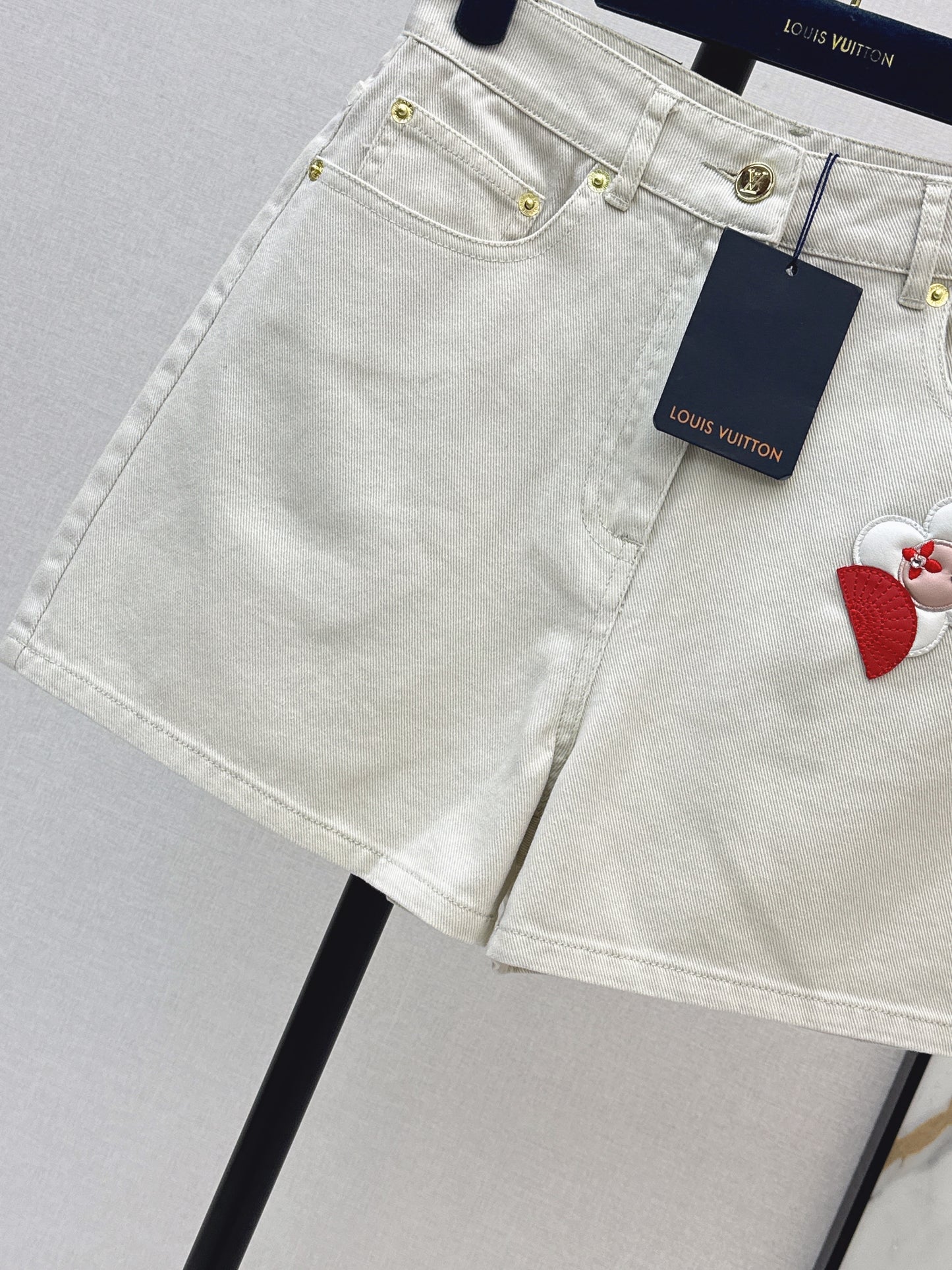 Embroidered denim shorts