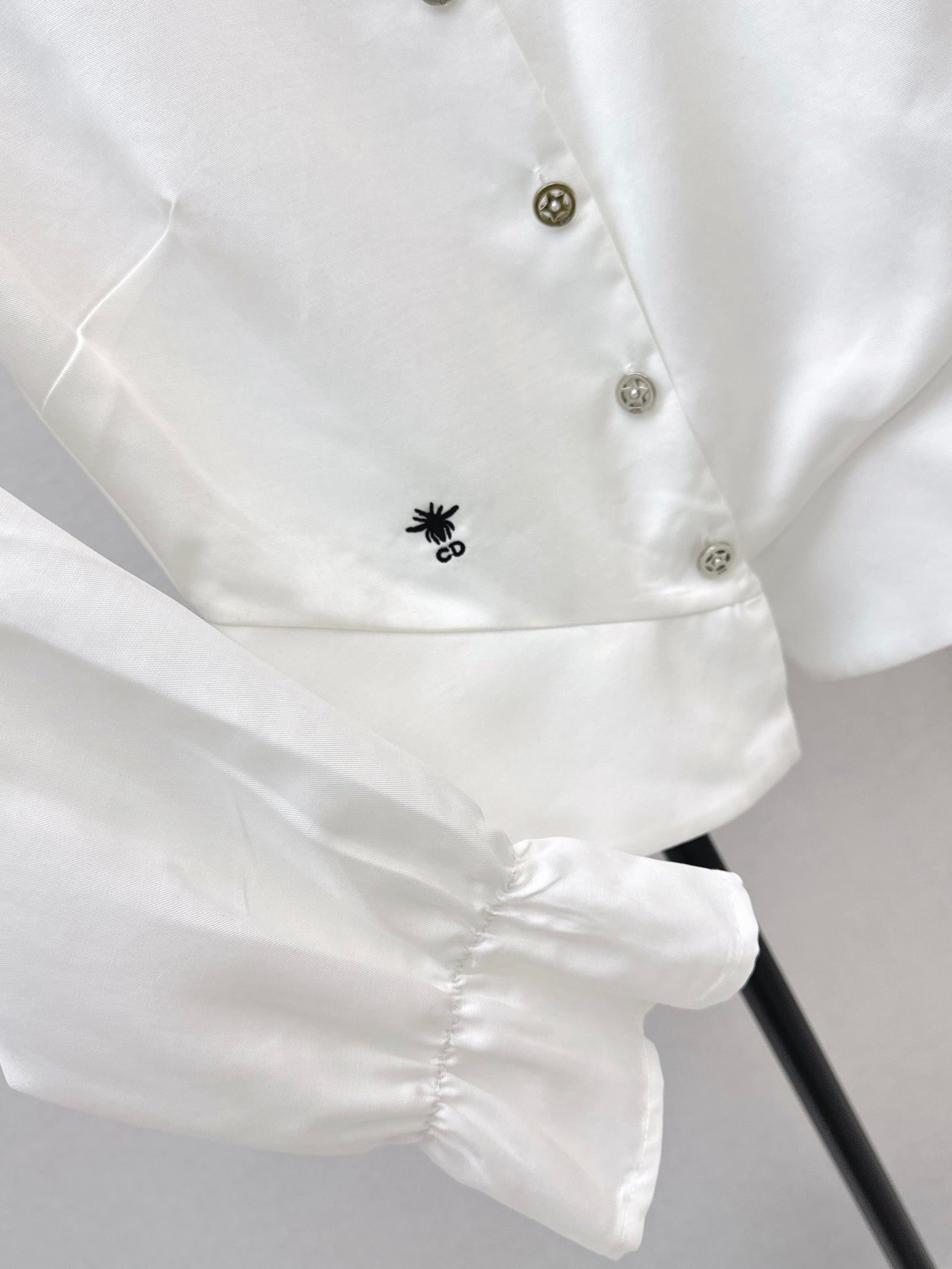 Ruffled trim waist-cinching shirt