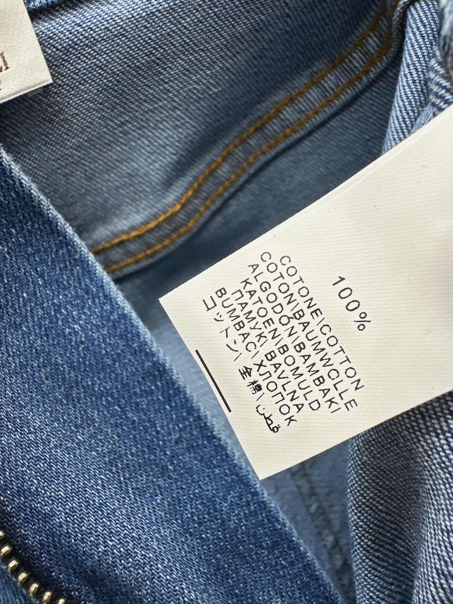 Belt-trimmed flared jeans