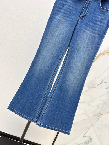 Belt-trimmed flared jeans