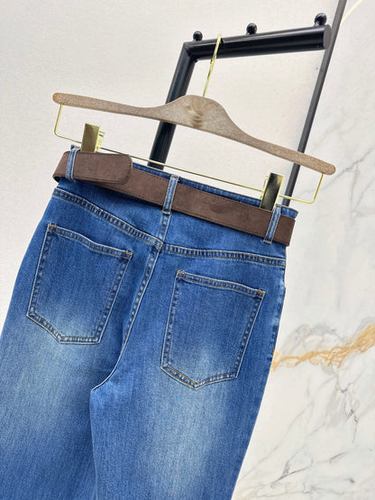 Belt-trimmed flared jeans
