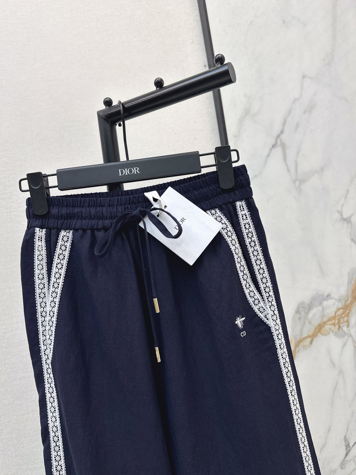 Lace-trimmed straight-leg trousers
