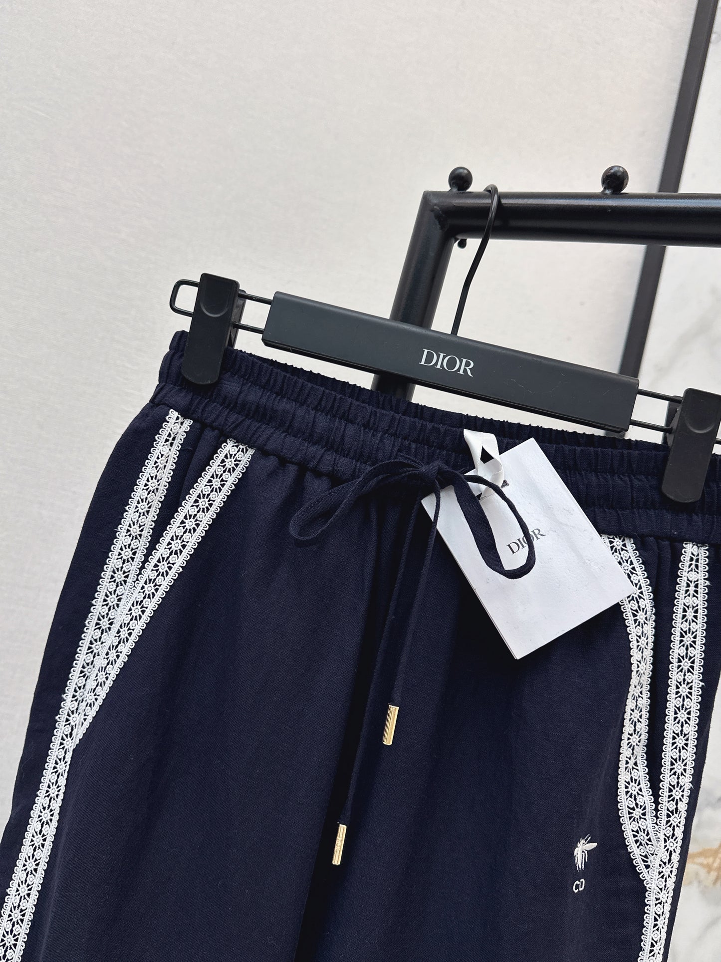 Lace-trimmed straight-leg trousers