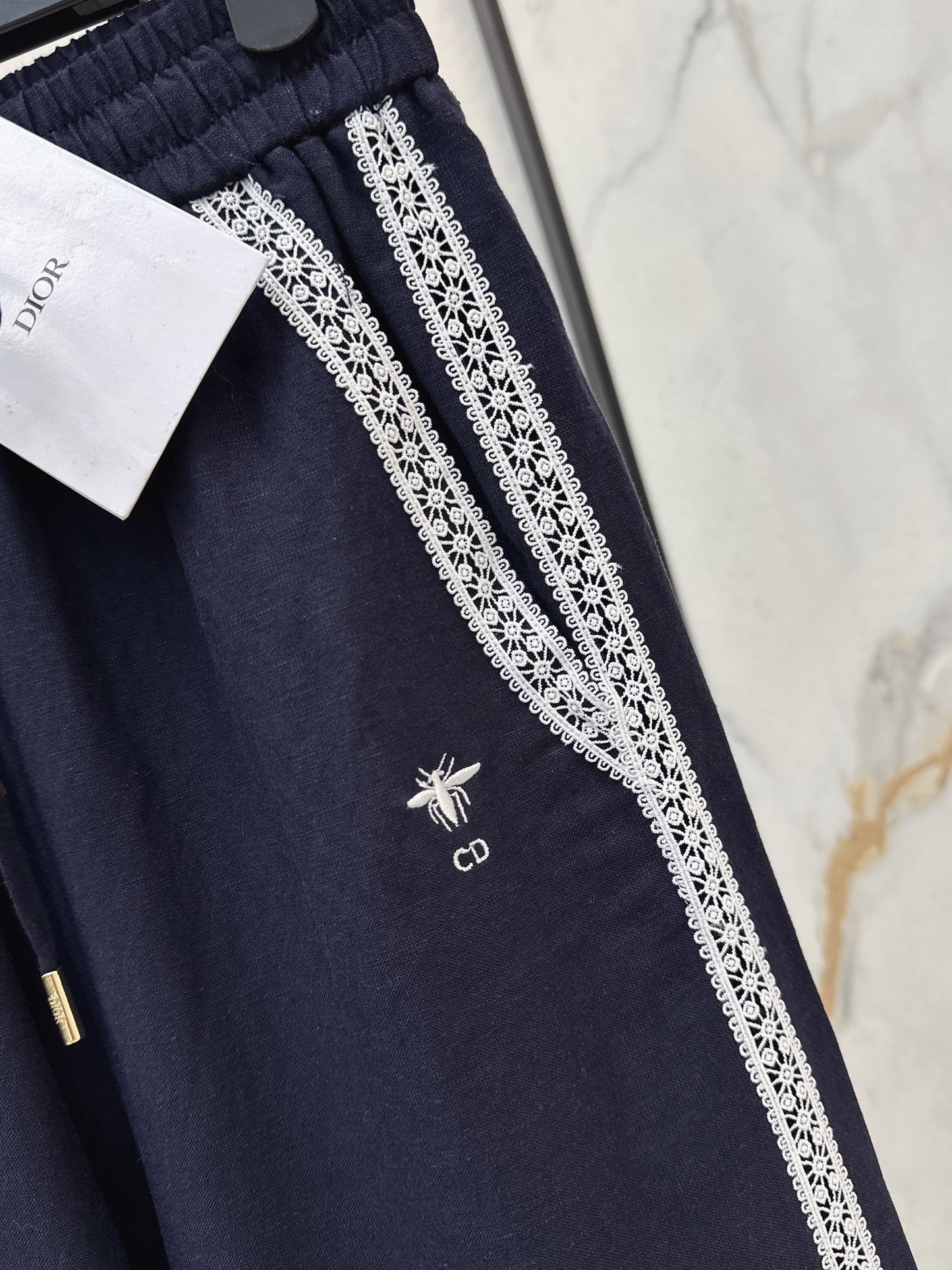 Lace-trimmed straight-leg trousers