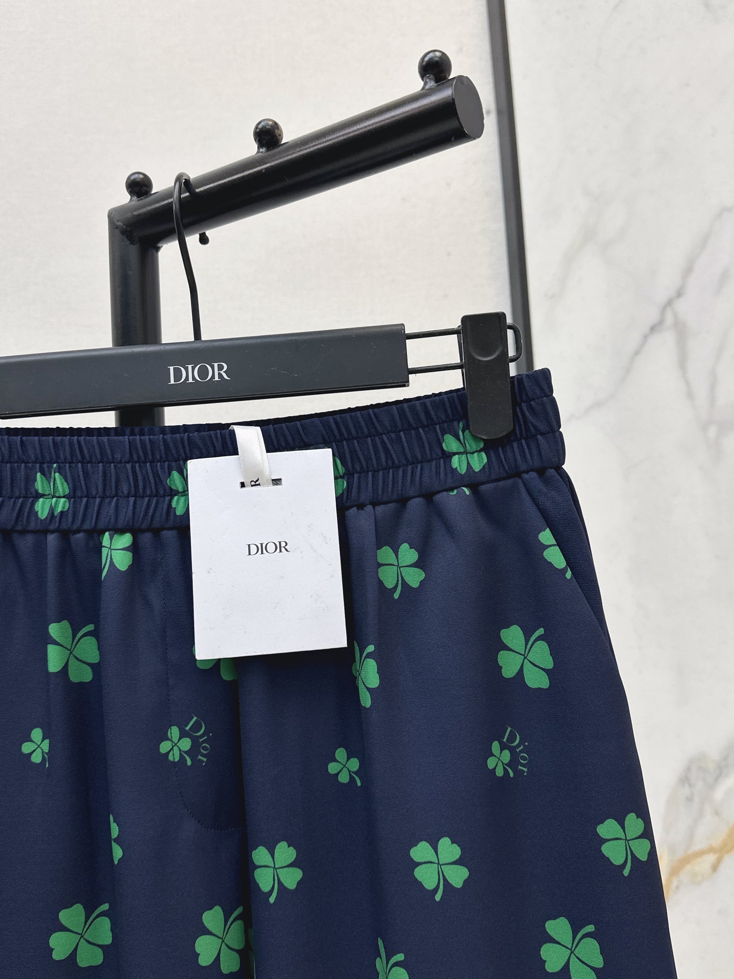 Four-leaf clover print straight-leg pants