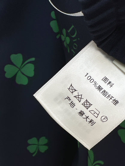 Four-leaf clover print straight-leg pants