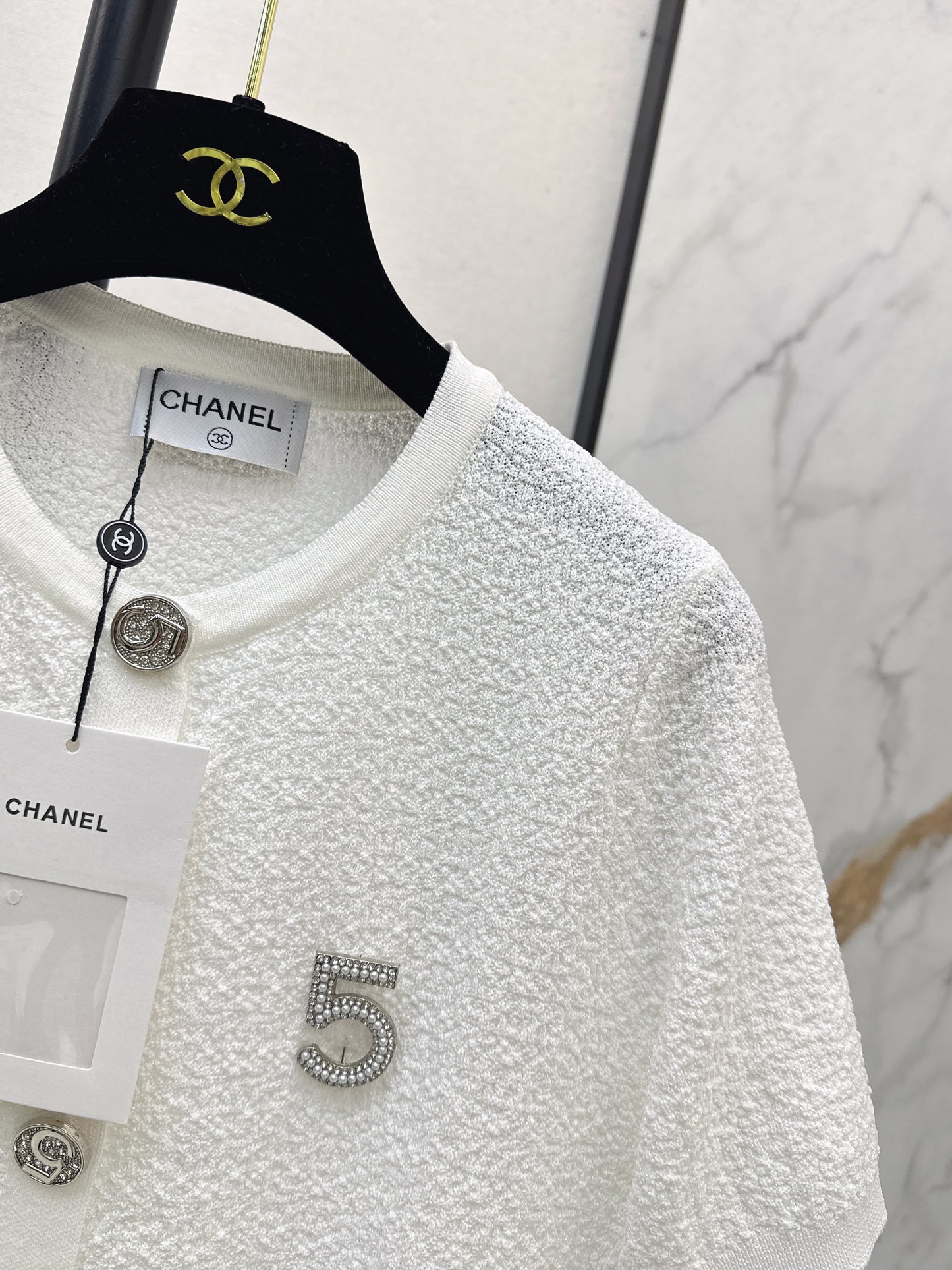 Hardware-embellished knitted T-shirt