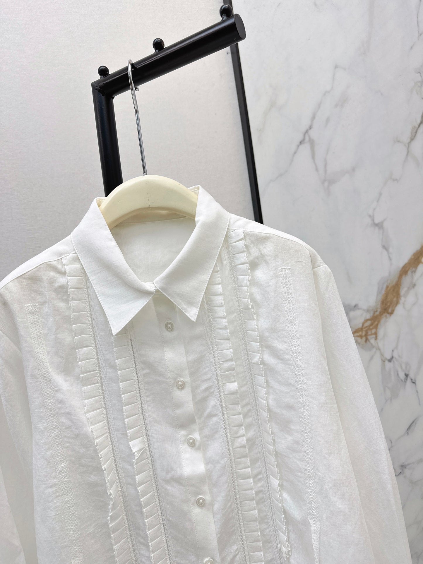 White shirt with ruffled trim