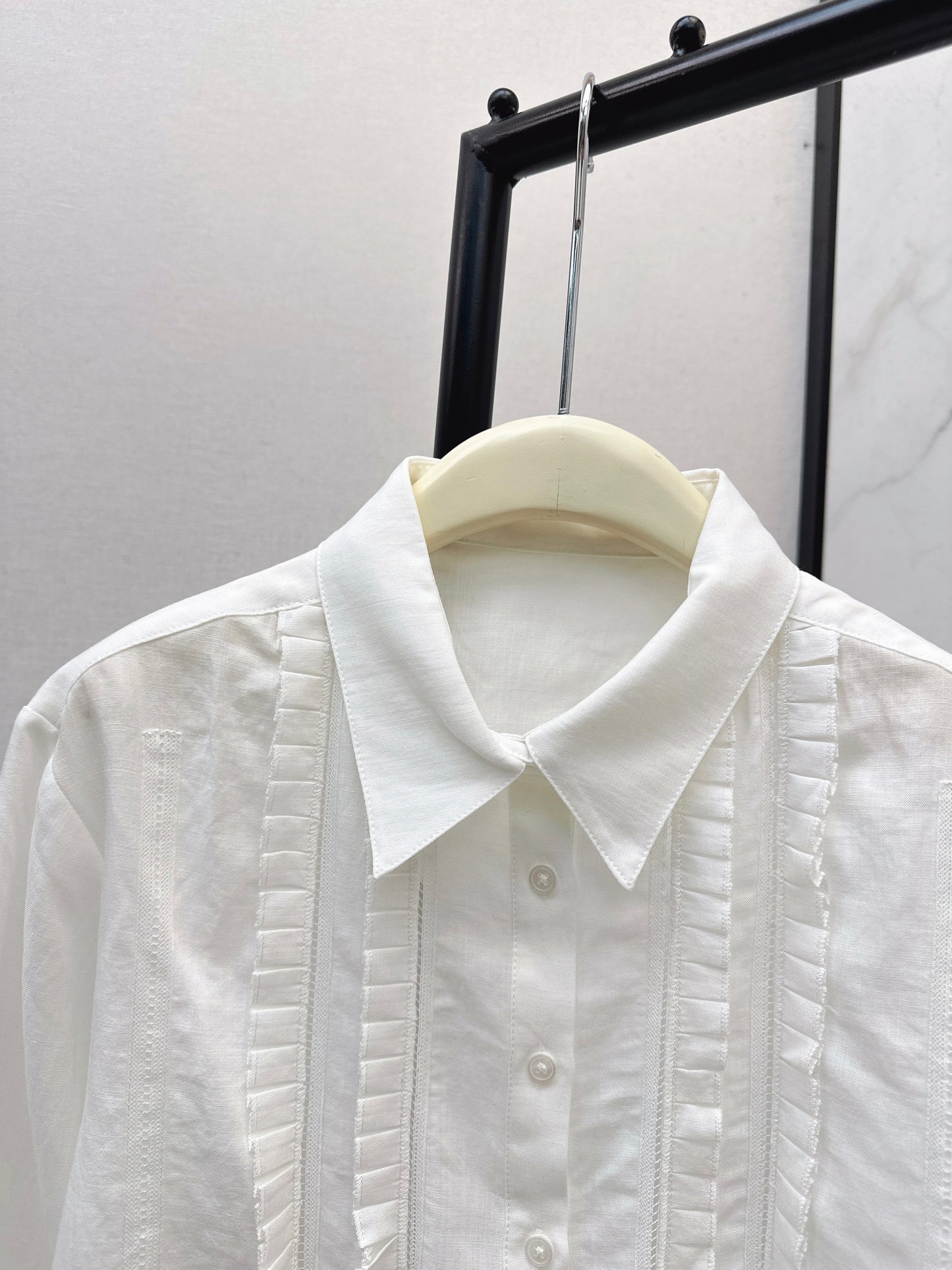 White shirt with ruffled trim