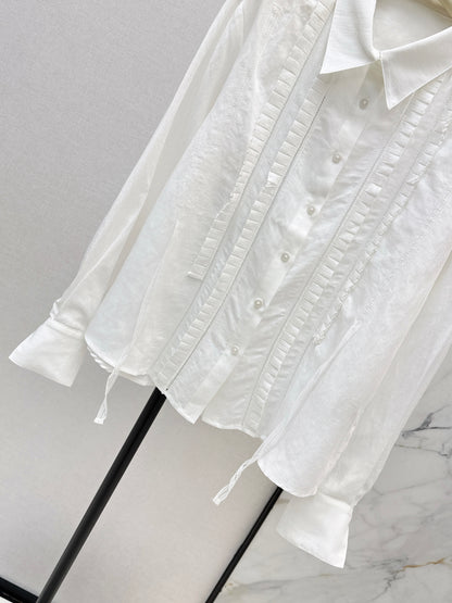 White shirt with ruffled trim