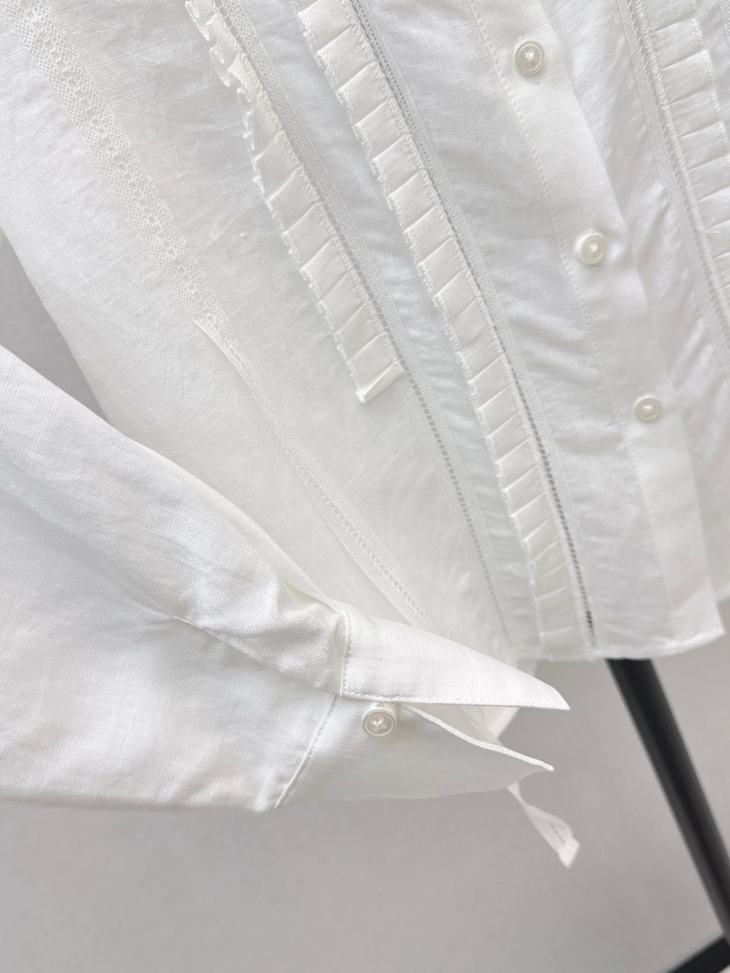 White shirt with ruffled trim