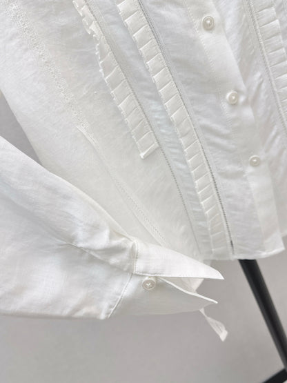 White shirt with ruffled trim