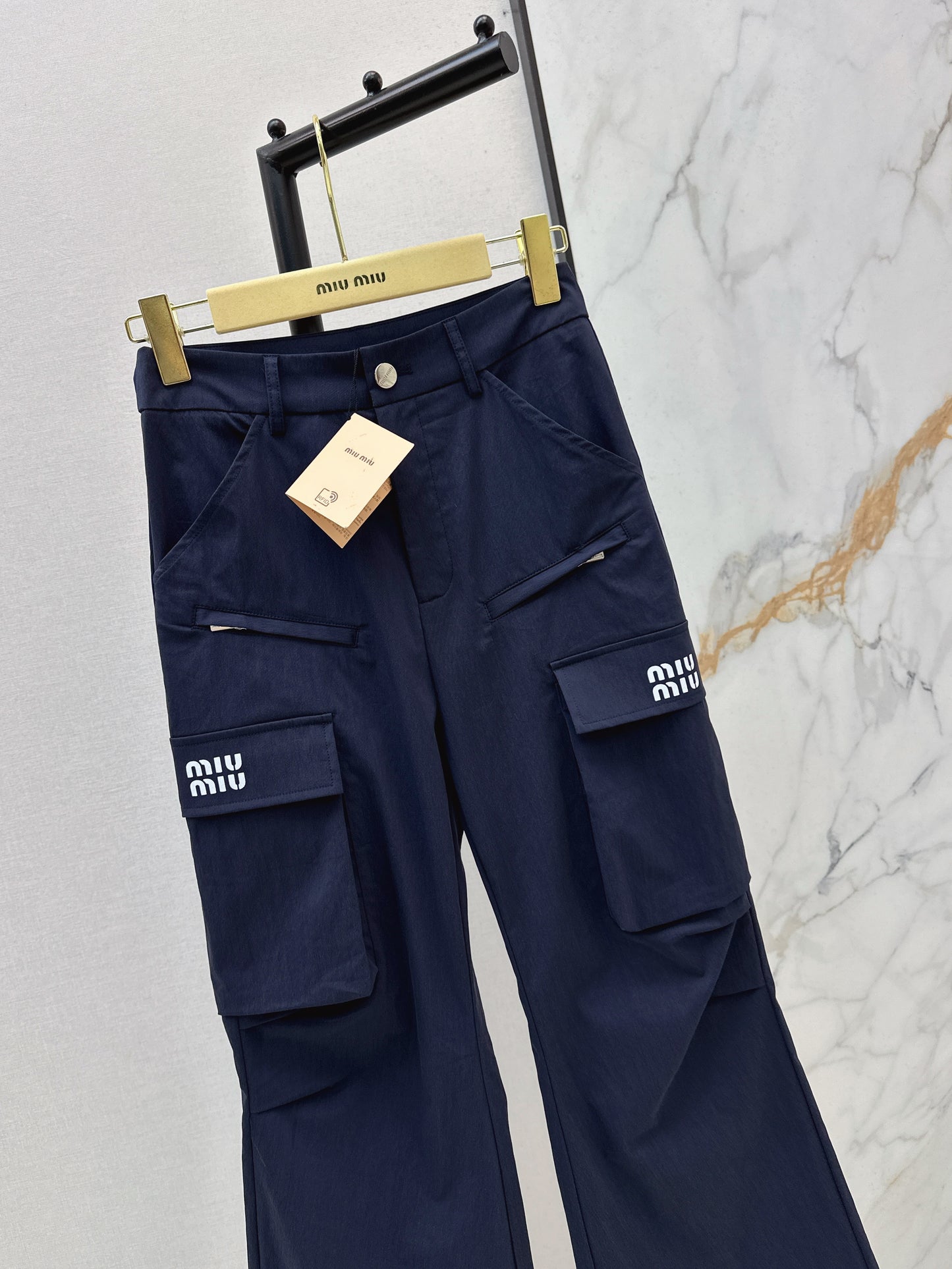 26ss Cargo-style wide-leg trousers