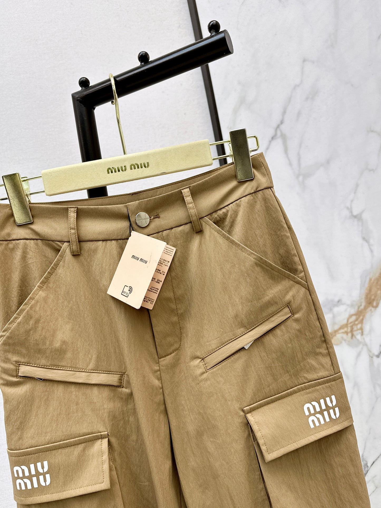 26ss Cargo-style wide-leg trousers